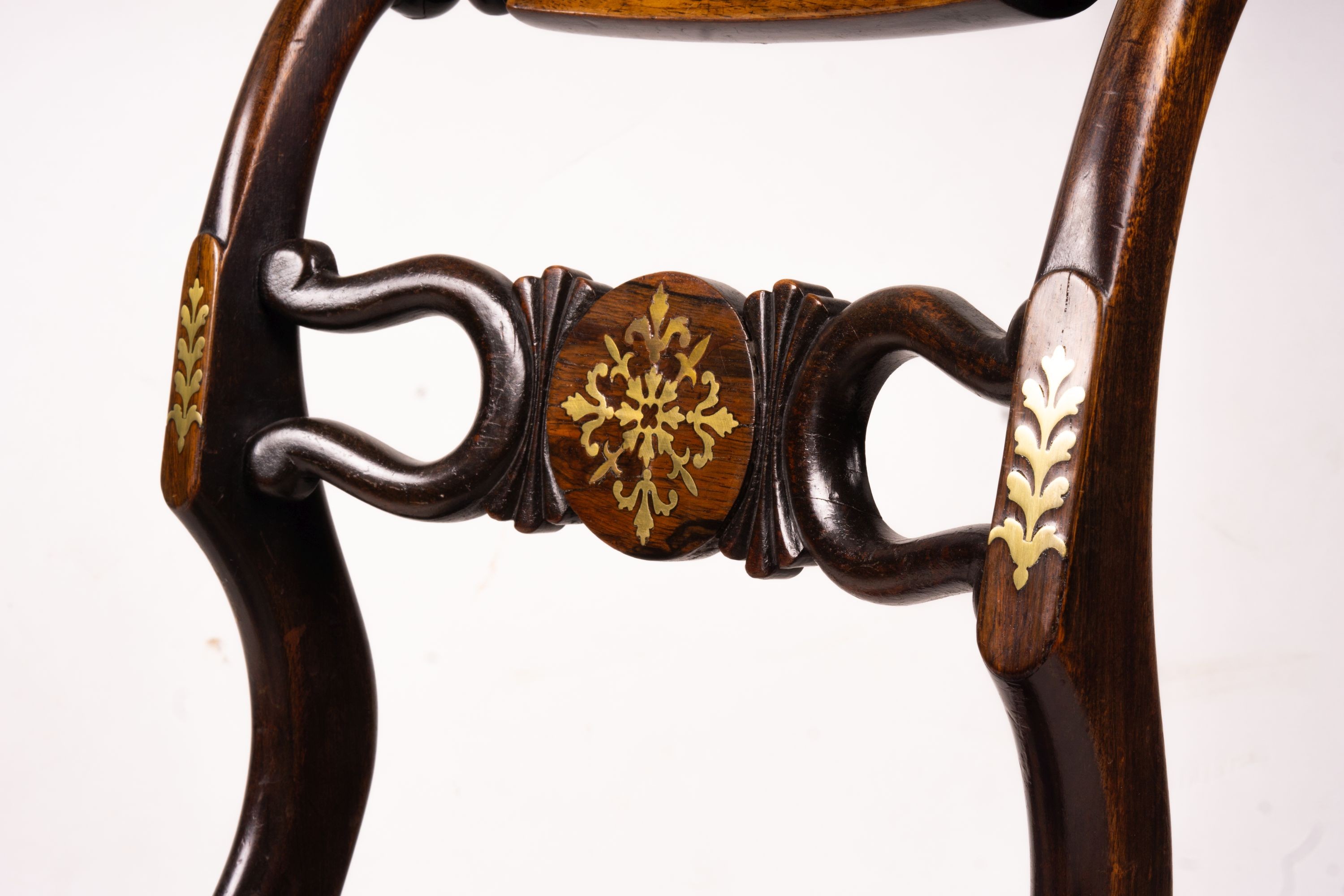 A set of six Regency brass inset simulated rosewood dining chairs